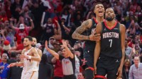 Houston Rockets forward Jabari Smith Jr. (10) celebrates forward Kevin Durant (7) three point winning basket against the Phoenix Suns in the fourth quarter at Toyota Center.