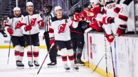 New Jersey Devils center Jack Hughes (86) celebrates after scoring a goal during the third period against the Seattle Kraken at Climate Pledge Arena.