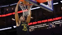 Golden State Warriors forward Trayce Jackson-Davis (32) dunks the ball against the Miami Heat during the fourth quarter at Chase Center.