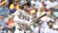 San Diego Padres center fielder Jackson Merrill (3) hits an RBI double during the first inning against the Arizona Diamondbacks at Petco Park.
