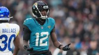 Jacksonville Jaguars wide receiver Travis Hunter (12) reacts after a play against the Los Angeles Rams during the second half of an NFL International Series game at Wembley Stadium.