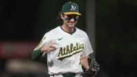 Athletics shortstop Jacob Wilson (5) jogs towards the dugout against the Houston Astros in the seventh inning at Sutter Health Park.
