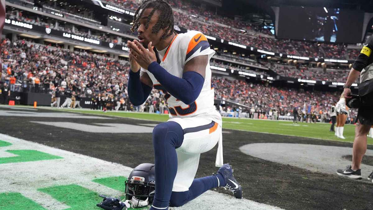 Denver Broncos cornerback Jahdae Barron (23) kneels in the end zone prior to a game against the Las Vegas Raiders during the first half at Allegiant Stadium.