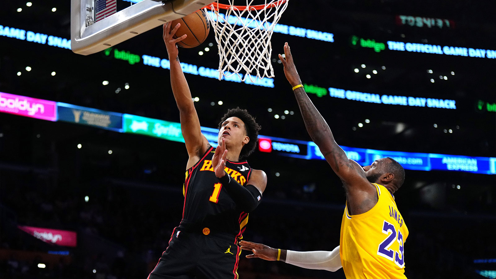 Atlanta Hawks forward Jalen Johnson (1) shoots the ball against Los Angeles Lakers forward LeBron James (23) in the first half at Crypto.com Arena.