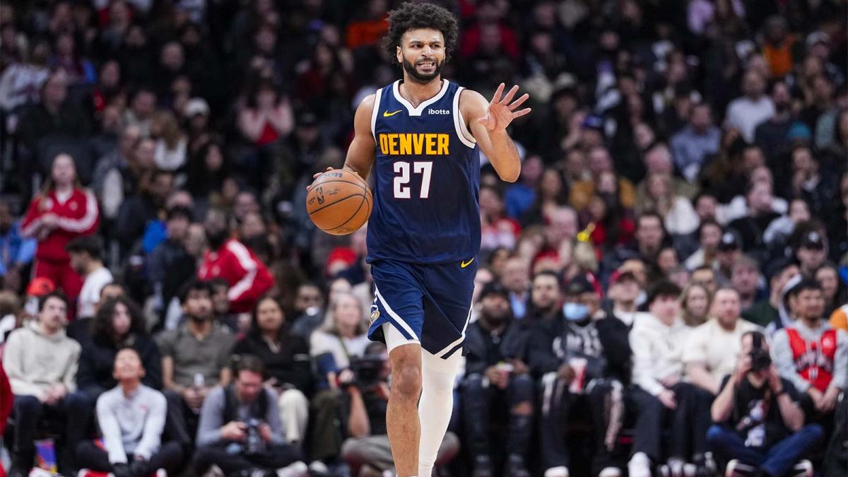 Denver Nuggets guard Jamal Murray (27) dribbles against the Toronto Raptors during the second half at Scotiabank Arena.