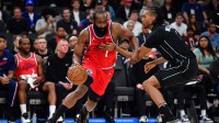 Los Angeles Clippers guard James Harden (1) moves to the basket against Brooklyn Nets center Nic Claxton (33) during the first half at Intuit Dome.