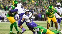 James Madison Dukes running back Wayne Knight (3) rushes during the third quarter against the Oregon Ducks at Autzen Stadium.