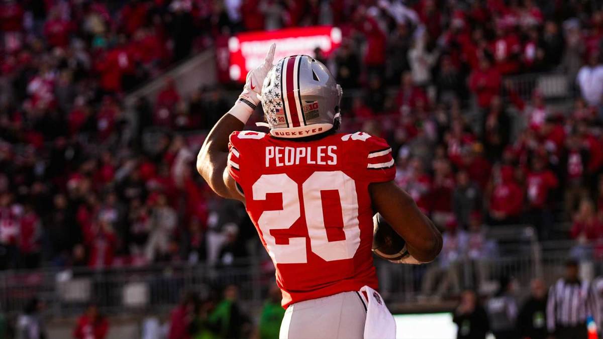Ohio State Buckeyes running back James Peoples (20) celebrates after scoring a touchdown in the second half of the NCAA football game at Ohio Stadium.