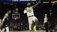Los Angeles Lakers forward LeBron James (23) puts up a shot during the second half after a foul was called against Portland Trail Blazers forward Toumani Camara (33) at Moda Center.