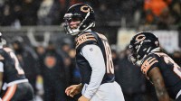 Chicago Bears quarterback Caleb Williams (18) calls the snap count from shotgun formation against the Los Angeles Rams during the third quarter of an NFC Divisional Round game at Soldier Field. Mandatory Credit: Matt Marton-Imagn Images