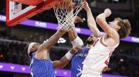 Jan 2, 2026; Chicago, Illinois, USA; Chicago Bulls forward Matas Buzelis (14) scores against the Orlando Magic during the first half at United Center. Mandatory Credit: Kamil Krzaczynski-Imagn Images