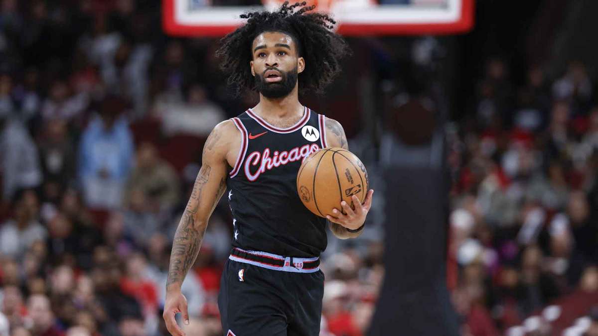 Jan 29, 2026; Chicago, Illinois, USA; Chicago Bulls guard Coby White (0) brings the ball up court against the Miami Heat during the first half at United Center. Mandatory Credit: Kamil Krzaczynski-Imagn Images