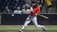 Boston Red Sox outfielder Jarren Duran (16) hits a two-run home run during the seventh inning against the Tampa Bay Rays at George M. Steinbrenner Field.