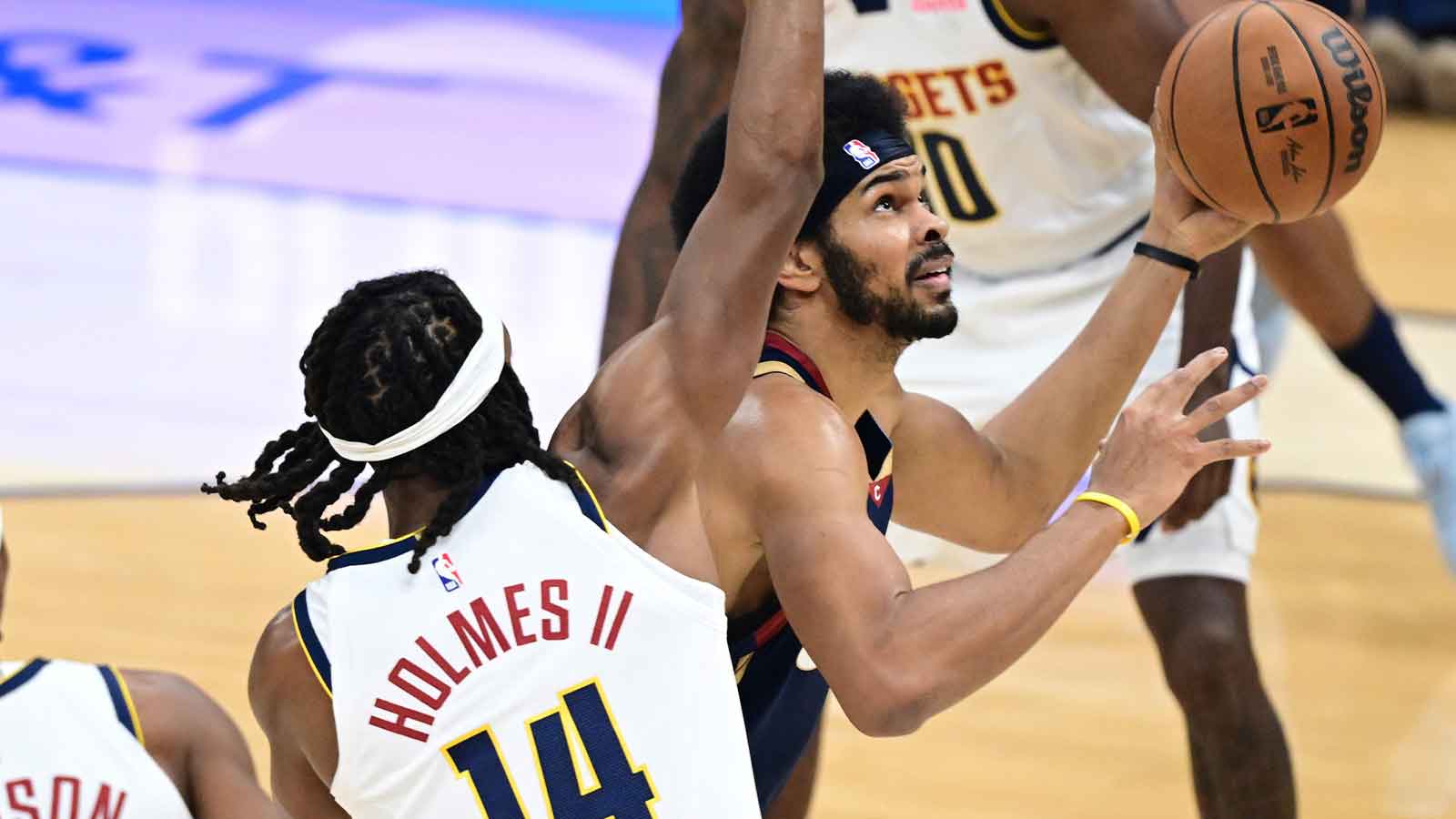 Cleveland Cavaliers center Jarrett Allen (31) goes to the basket against Denver Nuggets forward Daron Holmes II (14) during the first half at Rocket Arena.