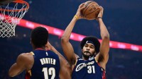 Cleveland Cavaliers center Jarrett Allen (31) grabs a rebound during the first half against the Denver Nuggets at Rocket Arena.