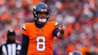 Denver Broncos quarterback Jarrett Stidham (8) reacts during the first half in the 2026 AFC Championship Game at Empower Field at Mile High.