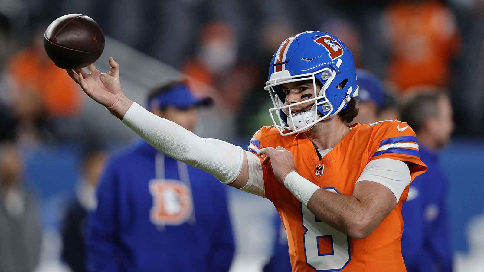 Denver Broncos quarterback Jarrett Stidham (8) practices before the game at Empower Field at Mile High.