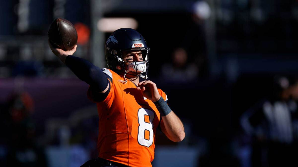Denver Broncos quarterback Jarrett Stidham (8) warms up before a game against the Green Bay Packers at Empower Field at Mile High.