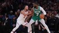 Boston Celtics guard Jaylen Brown (7) is defended by New York Knicks guard Jalen Brunson (11) during the first half at Madison Square Garden.