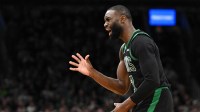 Boston Celtics guard Jaylen Brown (7) reacts after a non-call against the San Antonio Spurs during the second half at the TD Garden.