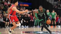 Boston Celtics guard Jaylen Brown (7) dribbles the ball against LA Clippers guard Kobe Sanders (4) in the second half at Intuit Dome.