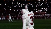Alabama's Jaylen Mbakwe (3) signals after praying in the end zone before the College Football Playoff game between the University of Oklahoma Sooners (OU) and the Alabama Crimson Tide at the Gaylord Family - Oklahoma Memorial Stadium.