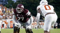 Mississippi State Bulldogs offensive linemen Jayvin Q. James (77) waits for the snap during the third quarter against the Texas Longhorns at Davis Wade Stadium at Scott Field