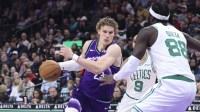 Utah Jazz forward Lauri Markkanen (23) drives to the basket against the Boston Celtics during the second half at Delta Center.