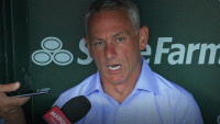 Chicago Cubs President Jed Hoyer answers questions before the game against the Cleveland Guardians at Wrigley Field. Mandatory Credit: David Banks-Imagn Images