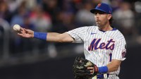 New York Mets second baseman Jeff McNeil (1) throws the ball to first base for an out during the sixth inning against the San Diego Padres at Citi Field.