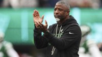 New York Jets head coach Aaron Glenn on the field prior to the game against the New England Patriots at MetLife Stadium.