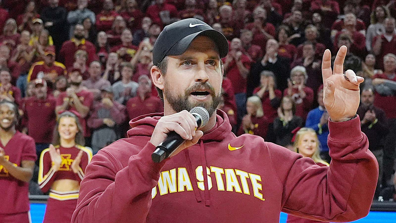 Iowa State football coach Jimmy Rogers speaks during a timeout in the first half in the Iowa State and Iowa men’s basketball Cy-Hawk series at Hilton coliseum on Dec. 11, 2025, in Ames, Iowa.