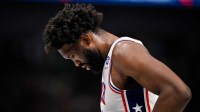 Philadelphia 76ers center Joel Embiid (21) looks on during the second quarter against the Dallas Mavericks at the American Airlines Center.