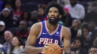 Philadelphia 76ers center Joel Embiid (21) shoots the ball against the Milwaukee Bucks during the fourth quarter at Xfinity Mobile Arena.