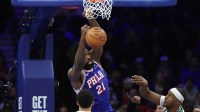 Philadelphia 76ers center Joel Embiid (21) dunks the ball against the Milwaukee Bucks during the second quarter at Xfinity Mobile Arena.