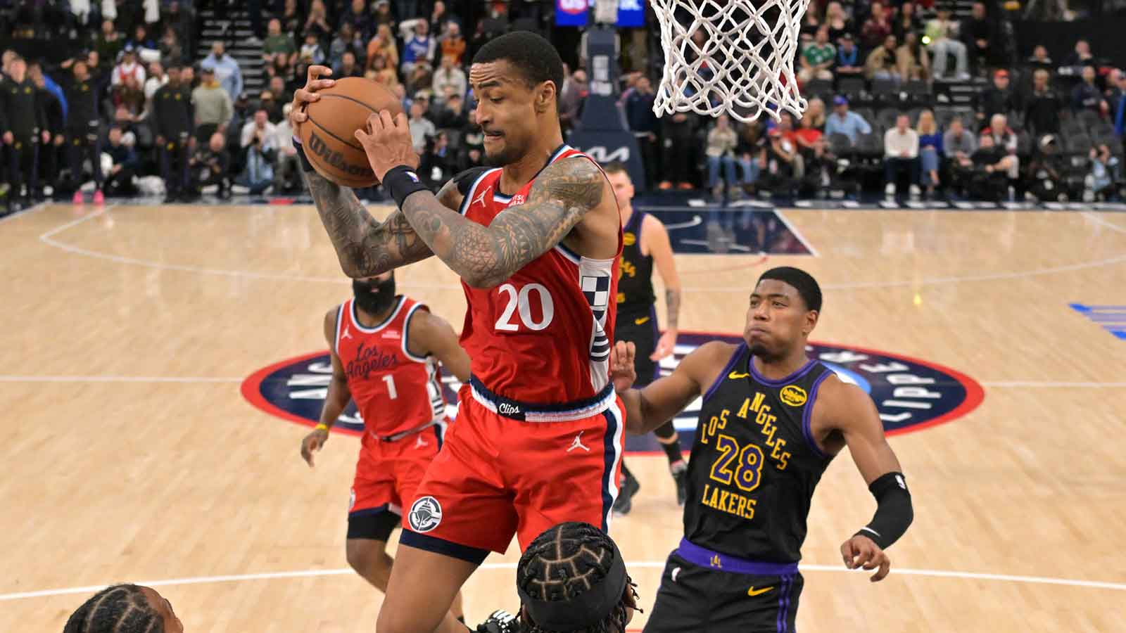 Los Angeles Clippers forward John Collins (20) rebounds in the second half against the Los Angeles Lakers at Intuit Dome.