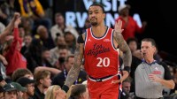 Los Angeles Clippers forward John Collins (20) heads down court after a 3-point basket in the second half against the Los Angeles Lakers at Intuit Dome.