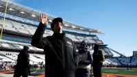 Baltimore Ravens head coach John Harbaugh waives to Baltimore Ravens fans before the NFL football game between Baltimore Ravens and Cincinnati Bengals at Paycor Stadium in Cincinnati on Dec. 14, 2025.