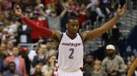 Washington Wizards guard John Wall (2) gestures on the court against the Boston Celtics in the fourth quarter in game six of the second round of the 2017 NBA Playoffs at Verizon Center. The Wizards won 92-91, and tied the series at 3-3.