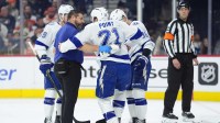 Tampa Bay Lightning center Brayden Point (21) is assisted after an injury against the Philadelphia Flyers in the second period at Xfinity Mobile Arena