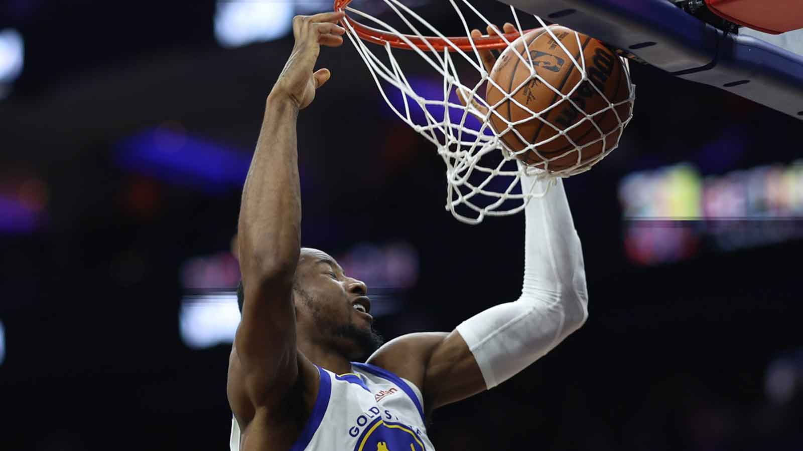 Golden State Warriors forward Jonathan Kuminga (1) dunks the ball against the Philadelphia 76ers during the third quarter at Xfinity Mobile Arena. 