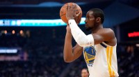 Golden State Warriors forward Jonathan Kuminga (1) shoots the ball against the Oklahoma City Thunder in the first quarter at the Chase Center.