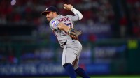 Houston Astros second baseman Jose Altuve (27) throws to first for the out against Los Angeles Angels right fielder Jo Adell (7) during the sixth inning at Angel Stadium.