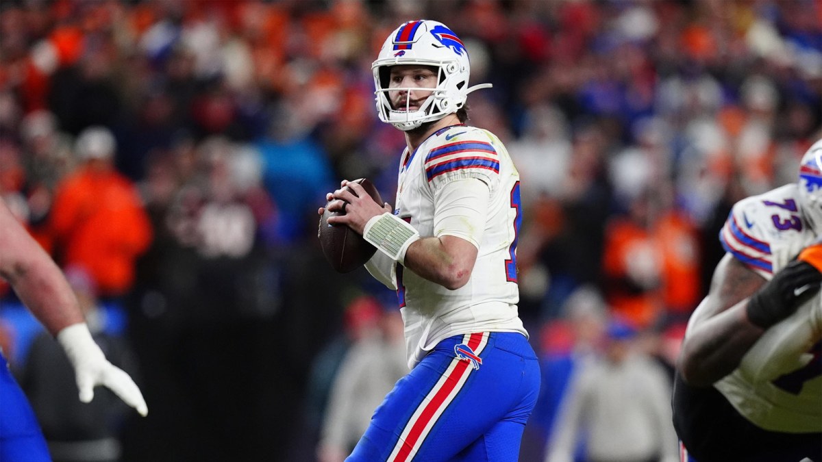 Buffalo Bills quarterback Josh Allen (17) drops to throw during the fourth quarter of an AFC Divisional Round playoff game against the Denver Broncos at Empower Field at Mile High.