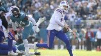 Buffalo Bills quarterback Josh Allen (17) looks to pass the ball during the second half against the Jacksonville Jaguars in an AFC Wild Card Round game at EverBank Stadium