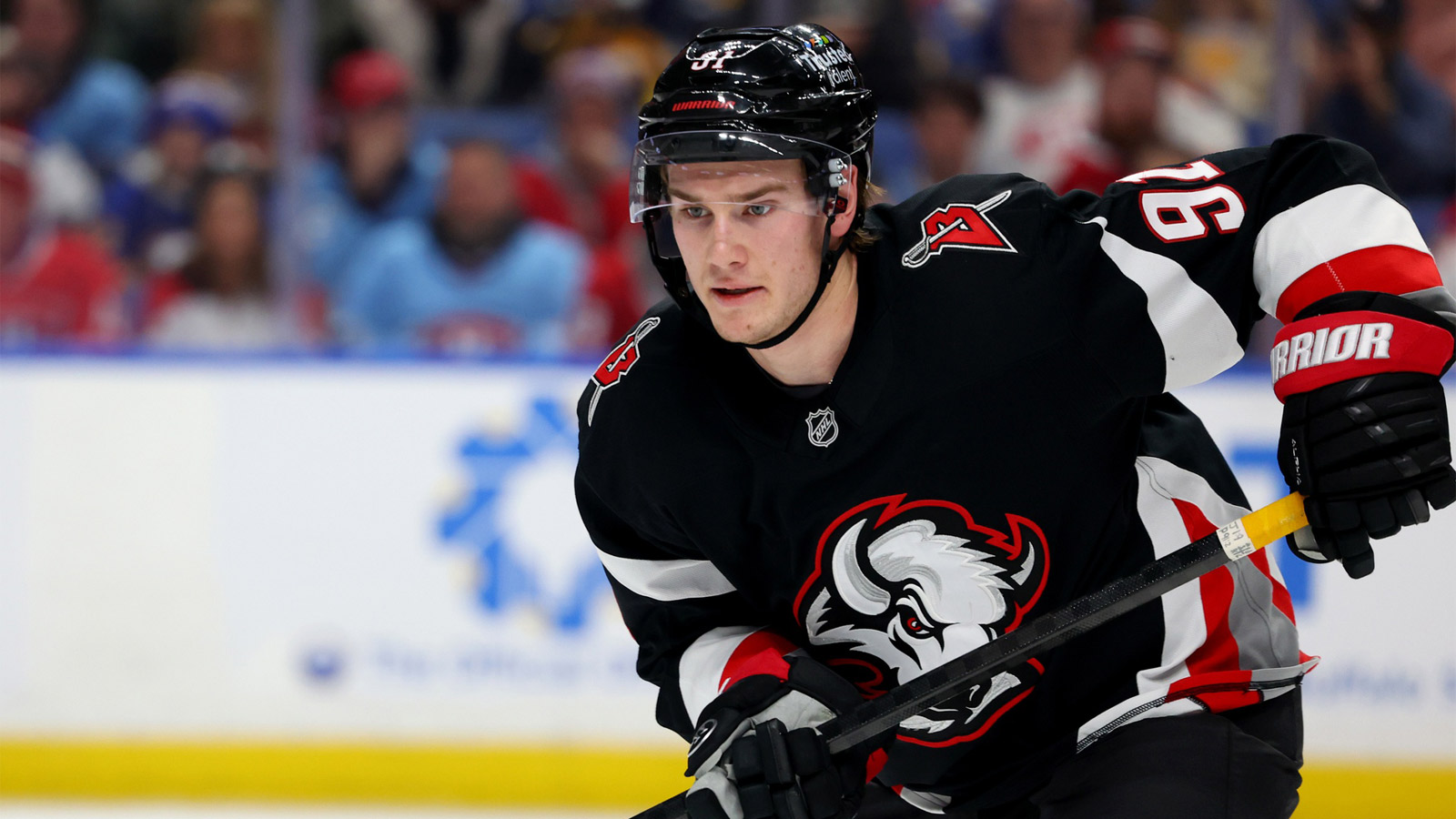Buffalo Sabres right wing Josh Doan (91) goes after a loose puck during the second period against the Montréal Canadiens at KeyBank Center.
