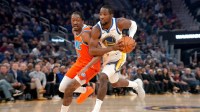 Golden State Warriors forward Jonathan Kuminga (1) drives past Oklahoma City Thunder guard Jalen Williams (8) in the first quarter at the Chase Center.