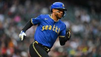 Seattle Mariners center fielder Julio Rodriguez (44) runs towards first base after hitting a double during the third inning against Cleveland Guardians at T-Mobile Park.