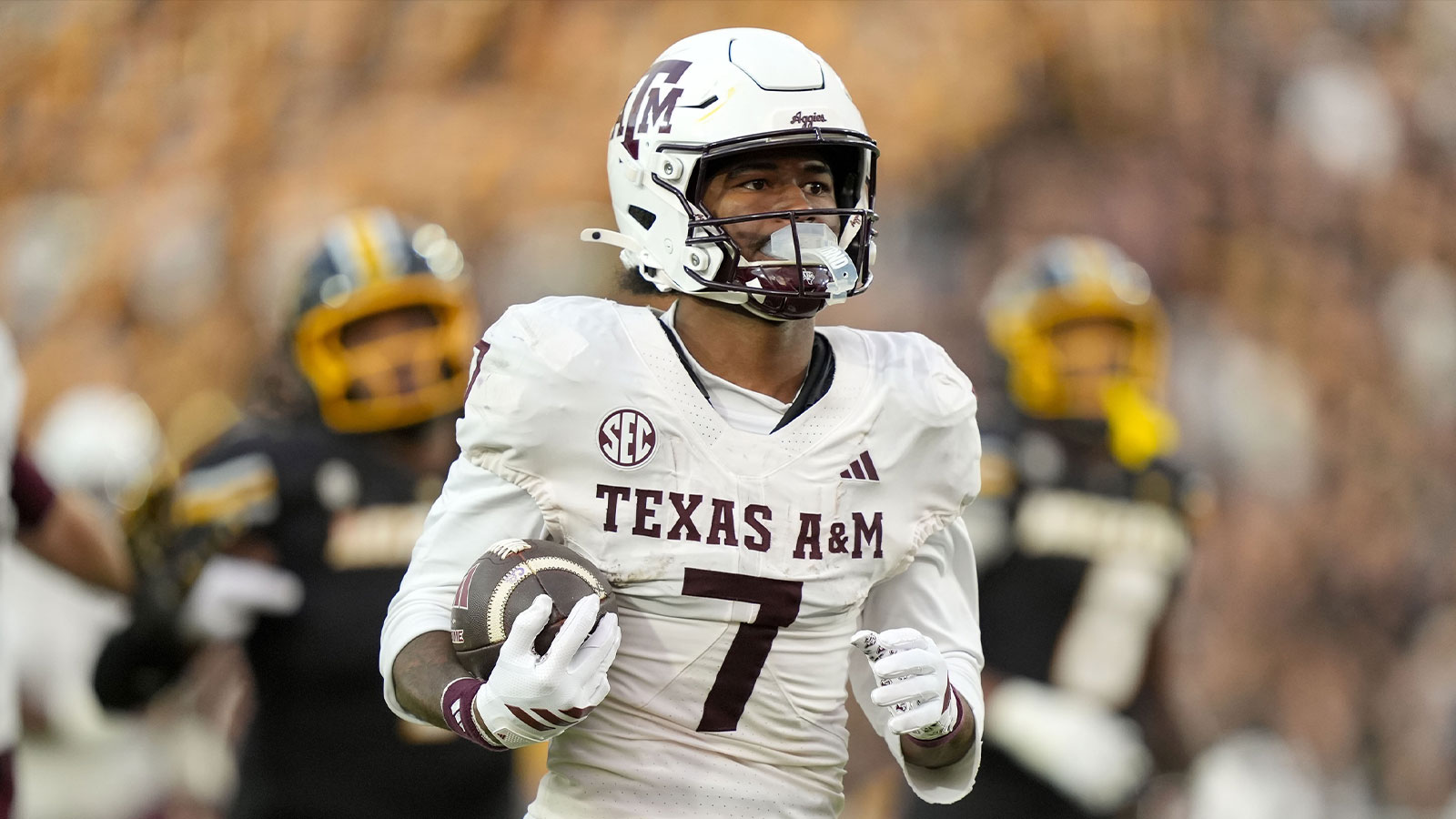 Texas A&M Aggies wide receiver KC Concepcion (7) runs for a touchdown during the second half against the Missouri Tigers at Faurot Field at Memorial Stadium.