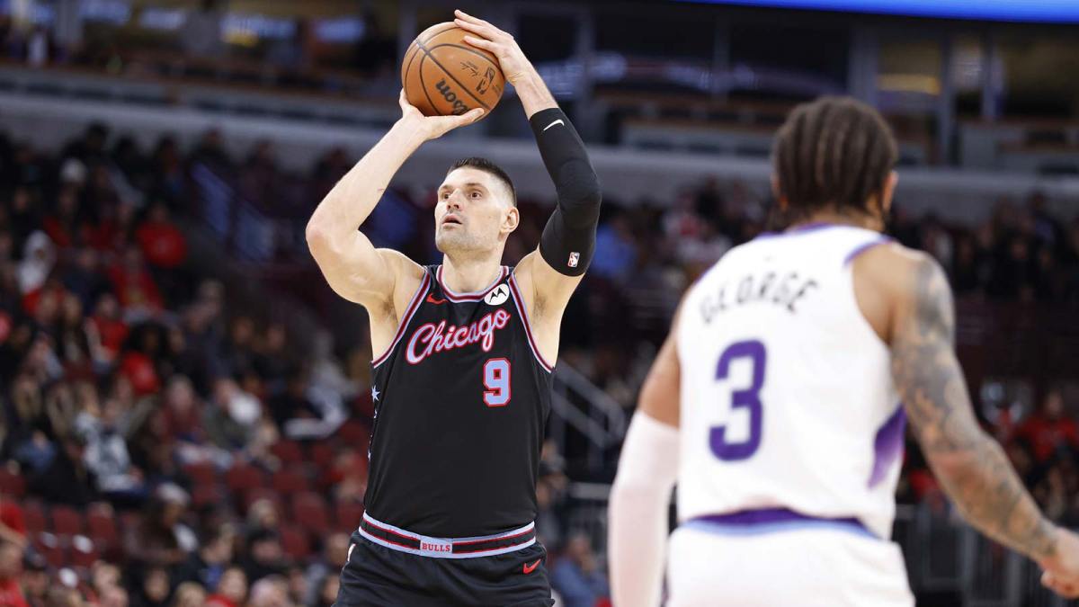 Jan 14, 2026; Chicago, Illinois, USA; Chicago Bulls center Nikola Vucevic (9) shoots against the Utah Jazz during the second half at United Center. Mandatory Credit: Kamil Krzaczynski-Imagn Images
